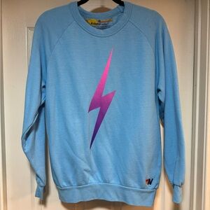 Aviator Nation Light Blue Sweater with Purple Lightning Bolt